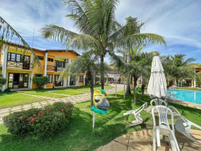 Casas com 3 suítes com ar condicionado em condominio a 200m da praia de Taperapuã, (Axé Mói)com piscinas, sauna, portaria 24hrs internet privativa 300MBPS